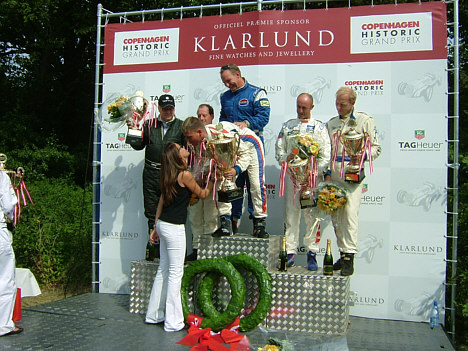 Prinsesse Marie overrakte præmierne i Royal Pro/Am, her til Ronnie Bremer flankeret på 2. pladsen af Stefan Winquist. På 2. pladsen (tv/fv) Tommy Kjehr og Jackie Oliver og på 3. pladsen David Brabham og Ralf Oehme.